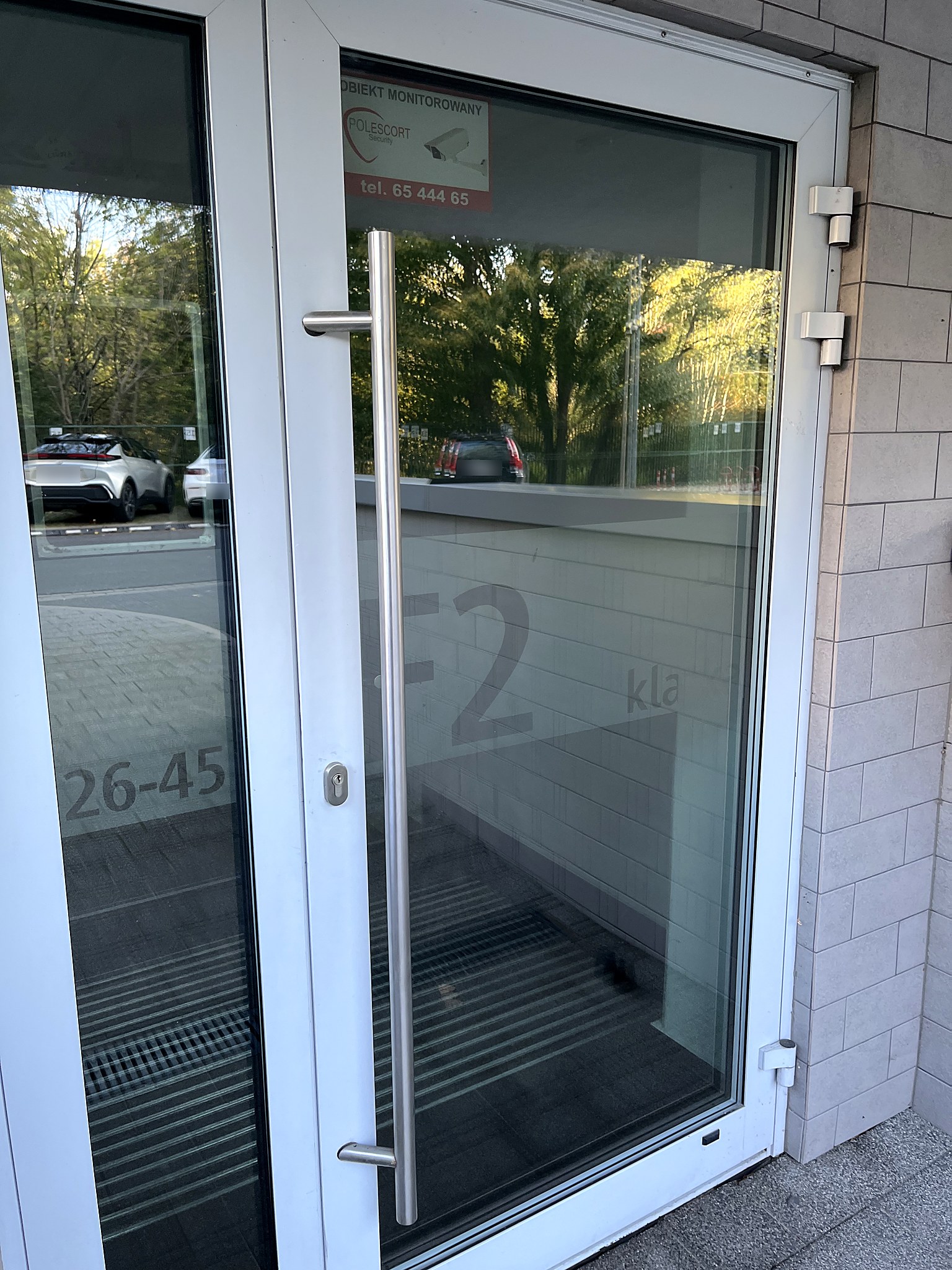 Wejście, klatka F2, Kancelaria Adwokacka LEX FORTE, ul. Jana Nowaka-Jeziorańskiego 12, Warszawa